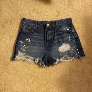 High Waisted Dark Denim Distressed Jean Shorts w/ White Paint Splatters